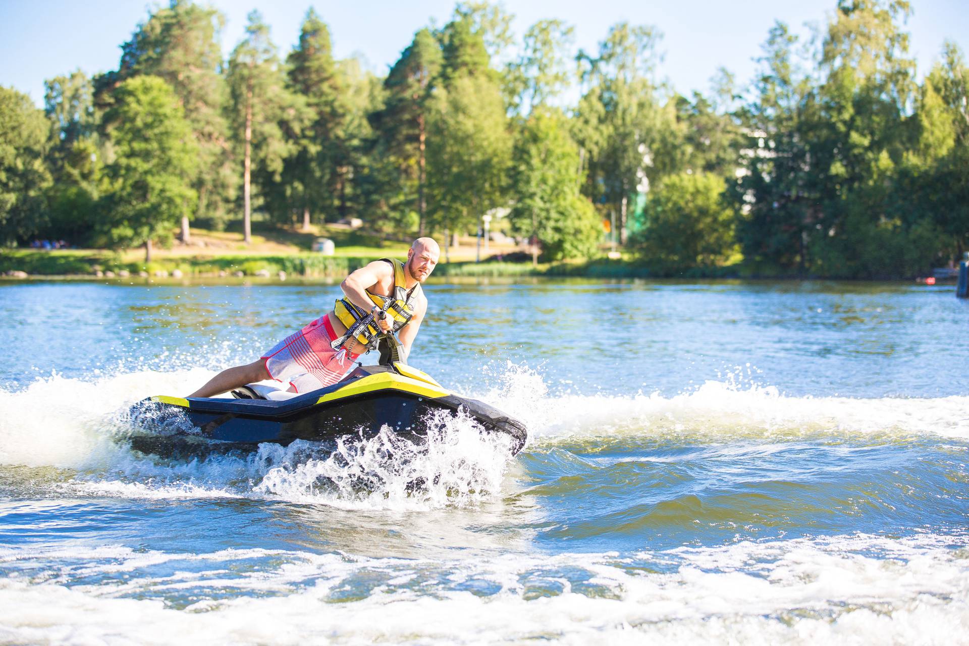 A man is driving at the water jet.