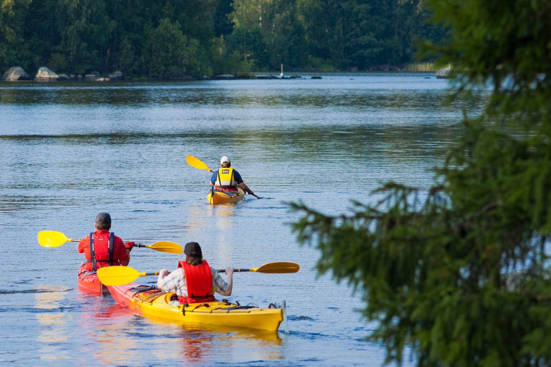 Three man are paddling in Valkeakoski