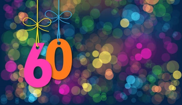 Graafisessa kuvassa numero 60 ja värikkäitä palloja.