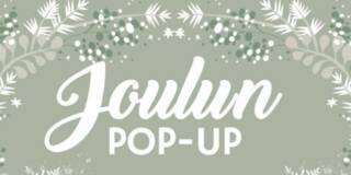 Graafista jouluista taustaa vasten teksti Joulun pop-up.