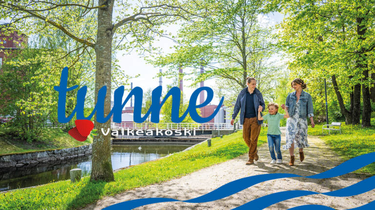 Perhe kävelee Kanavanrannassa, kuvassa teksti "Tunne Valkeakoski".